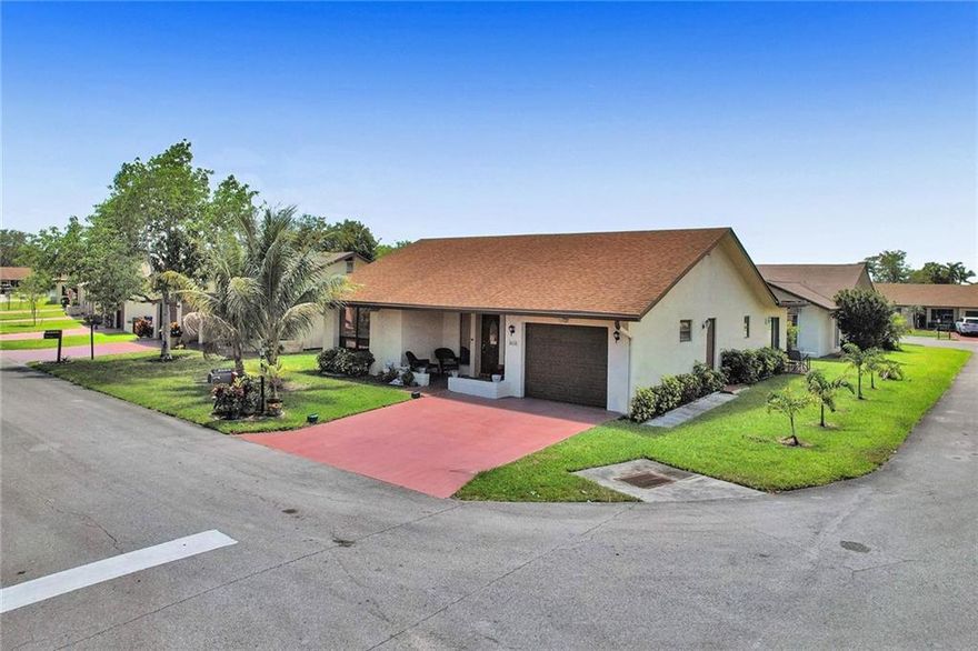 Beautiful, Single Family Home with Garage on a Spacious Corner Lot features 2/2, and Family Room. Living room and Dining are combined as a Great Room.  A large & open kitchen with pass thru is adjacent the garage which is convenient for grocery access. The Master suite features large closets & upgraded dressing area. The   home is on a low traffic lot that is walking distance to the active clubhouse and recreational activities. Low, low HOA fees are $550/QTR, and include cable/internet, clubhouse, pool, tennis, spa, bocce ball, exercise room, billiards, social clubs & weekly events. All common area landscape and yardcare are provided by the HOA, and so is the painting of each residence. Easy access to I-95, shopping & about 5 miles to the white sand and blue ocean at Deerfield Beach.