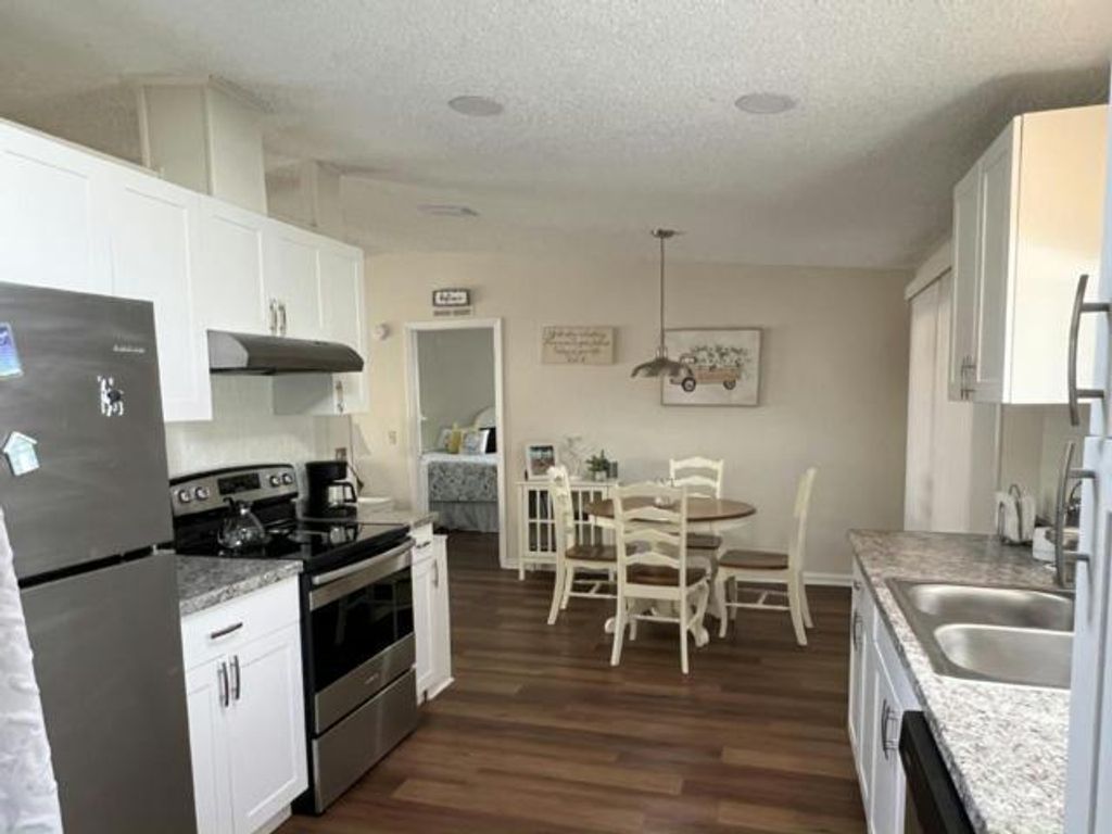 Photo of 4697 SE Copperwood Terrace, Stuart, FL 34997 (MLS # R11153588)