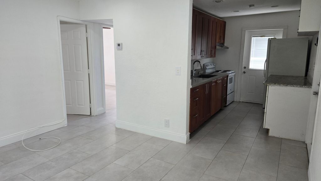 Photo of 1512 NE 28th Street, Pompano Beach, FL 33064 (MLS # B26016590)