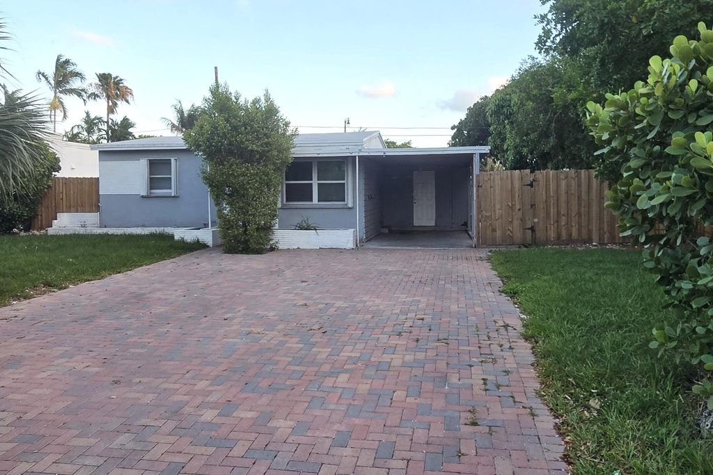 Photo of 1512 NE 28th Street, Pompano Beach, FL 33064 (MLS # B26016590)