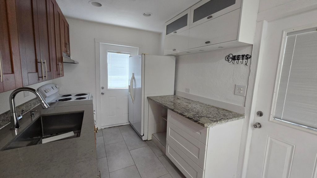 Photo of 1512 NE 28th Street, Pompano Beach, FL 33064 (MLS # B26016590)