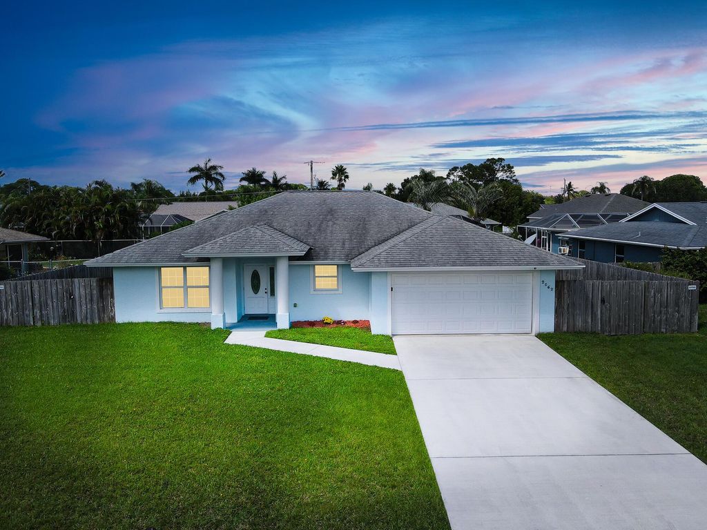 Photo of 2562 SE Marseille Street, Port St Lucie, FL 34952 (MLS # R10924473)