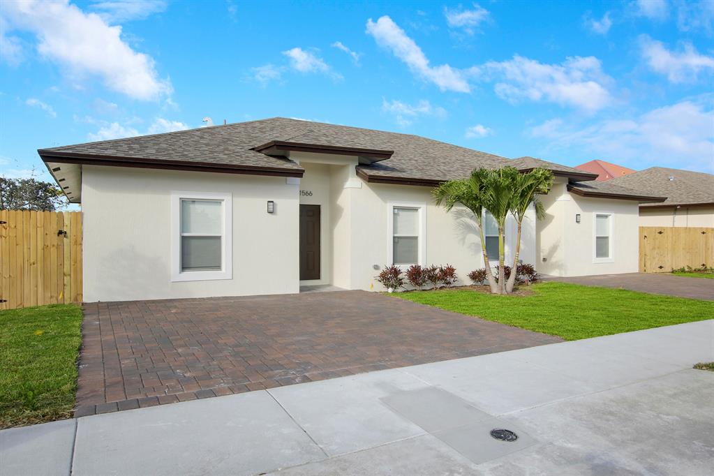 Step into luxury living in this beautiful never lived in 3-bedroom, 2.5-bathroom rental with all the modern conveniences. The updated kitchen boasts stainless steel appliances, all windows have blinds for added privacy (but back slider), while impact glass windows provide added security. Enjoy quiet afternoons in the fenced backyard with a paver patio or relax in one of the three spacious bedrooms. Don't miss out on this opportunity for a comfortable and stylish home. Water is included in the rent and comes with 2 parking spaces. Schedule a viewing today!