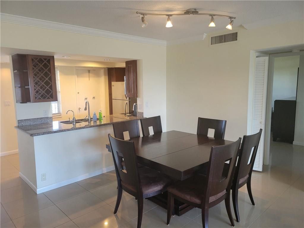 Photo of 3050 N Palm Aire Drive #508, Pompano Beach, FL 33069 (MLS # B26026857)