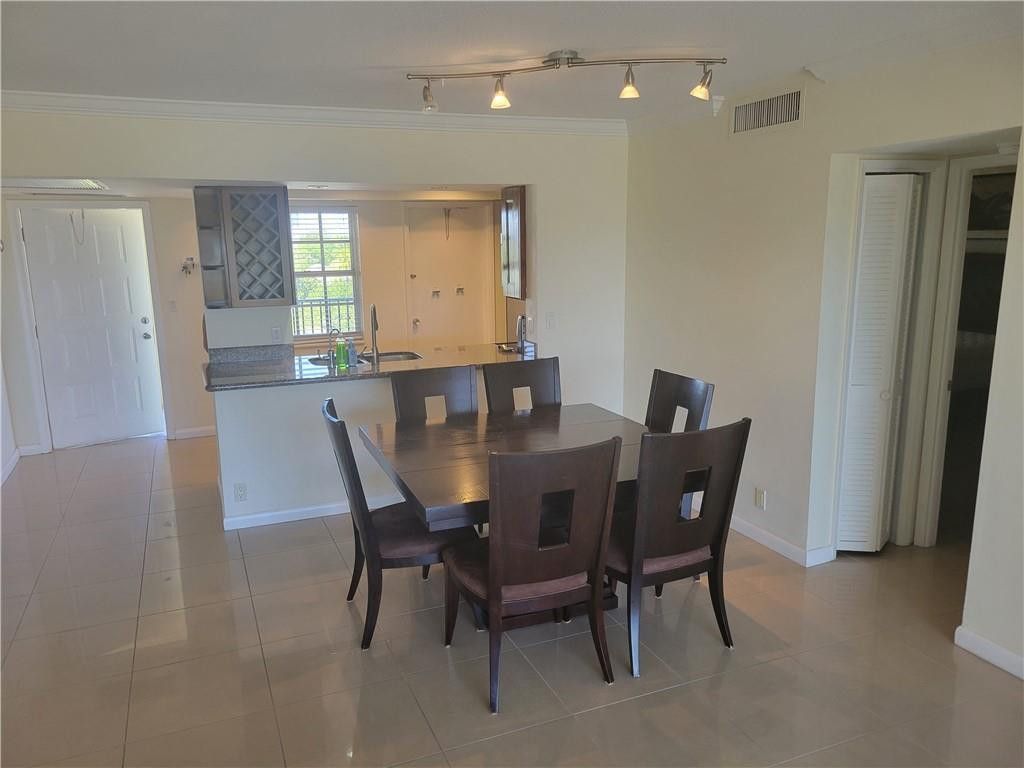Photo of 3050 N Palm Aire Drive #508, Pompano Beach, FL 33069 (MLS # B26026857)