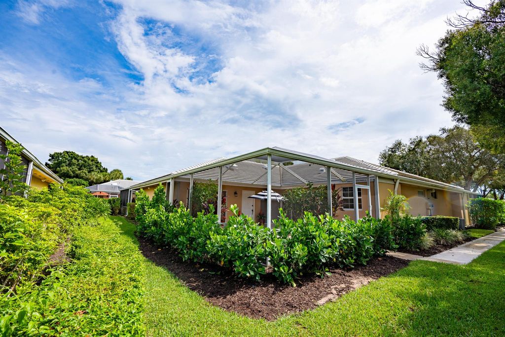 Photo of 3801 Ridgewood Drive, Palm Beach Gardens, FL 33403 (MLS # R10923923)