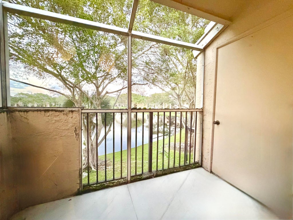 Photo of 651 CYPRESS LAKE Boulevard #L, Deerfield Beach, FL 33064 (MLS # B26092602)