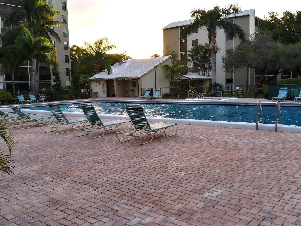 Photo of 2112 S Cypress Bend Drive #207, Pompano Beach, FL 33069 (MLS # F10544564)