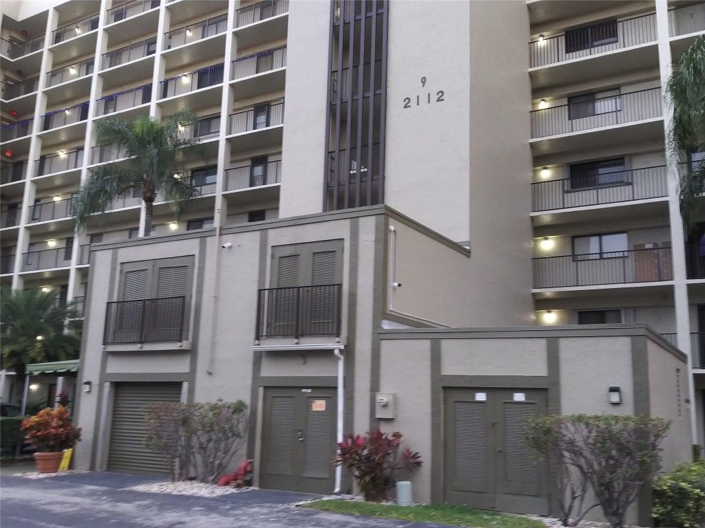 Photo of 2112 S Cypress Bend Drive #207, Pompano Beach, FL 33069 (MLS # F10544564)