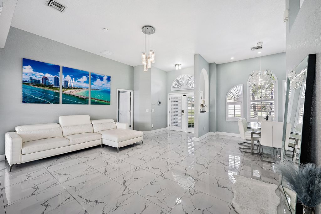 Photo of 650 SE Tanner Avenue, Port St Lucie, FL 34984 (MLS # R10868837)