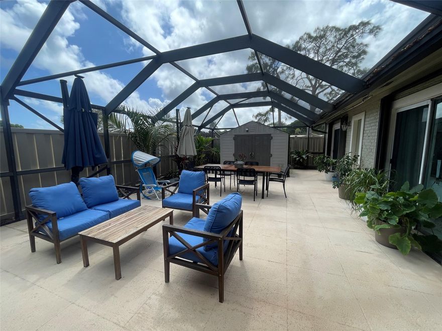 Stunning 3/2 single story villa in very desirable Westwood Garden in Palm Beach Gardens! This villa features a huge screened in patio with a bonus separate outdoor shed for storage! Luxury vinyl floors..Kitchen features include quartz counter tops, under counter lighting, tile backsplash, stainless steel appliances. Metal rood 2018..new A/C 2025. Accordian hurricane protection. Amenities featuring a children's playground, racquetball, pool, tennis and basketball courts. HOA covers exterior homeowners insurance!! Roof repairs, basic cable, lawn and landscaping, common area pest control, pool and recreation facilities. Prime location close to great shopping, restaurants, beaches and highways!!