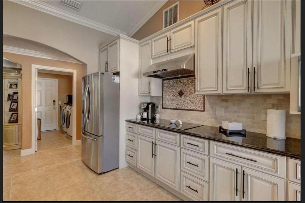 Photo of 2529 SW Grotto Circle, Port Saint Lucie, FL 34953 (MLS # R10924894)