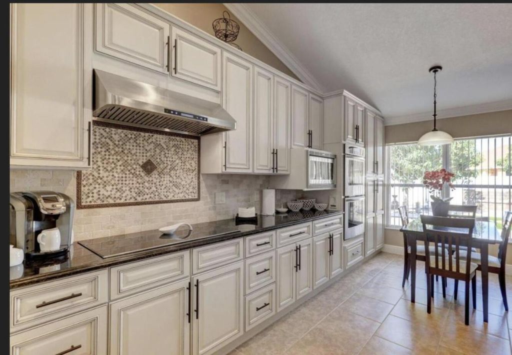 Photo of 2529 SW Grotto Circle, Port Saint Lucie, FL 34953 (MLS # R10924894)