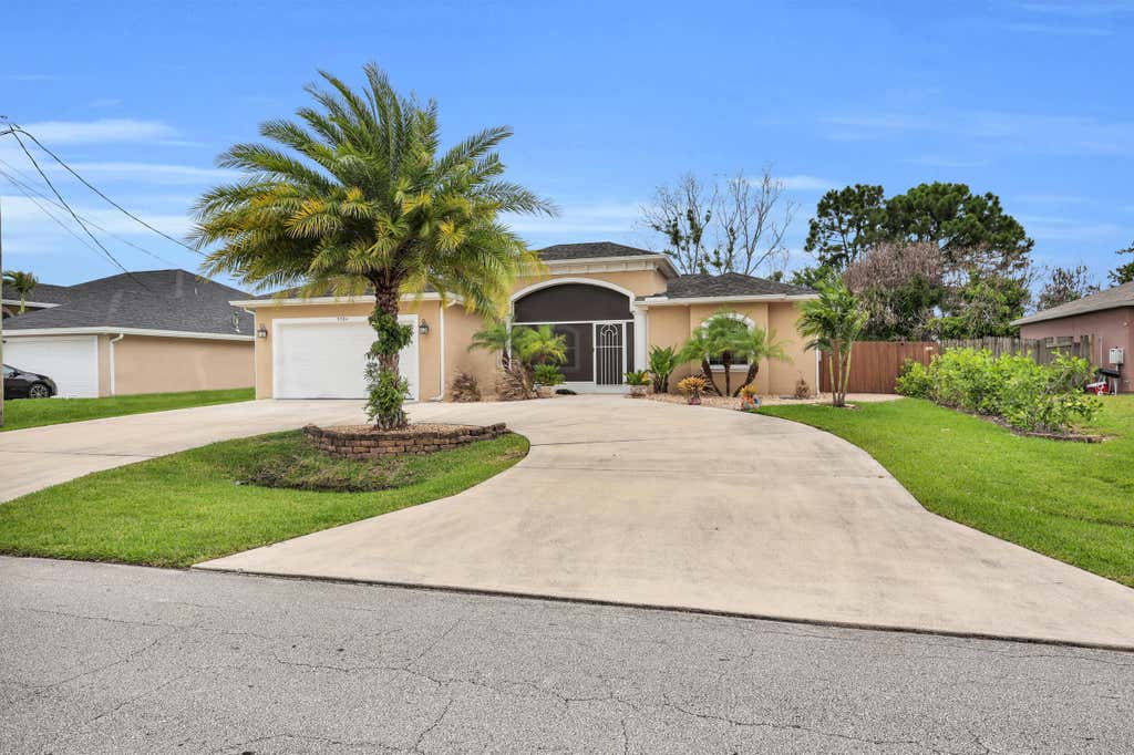 Photo of 5784 NW WESLEY Road, Port Saint Lucie, FL 34986 (MLS # B26060383)