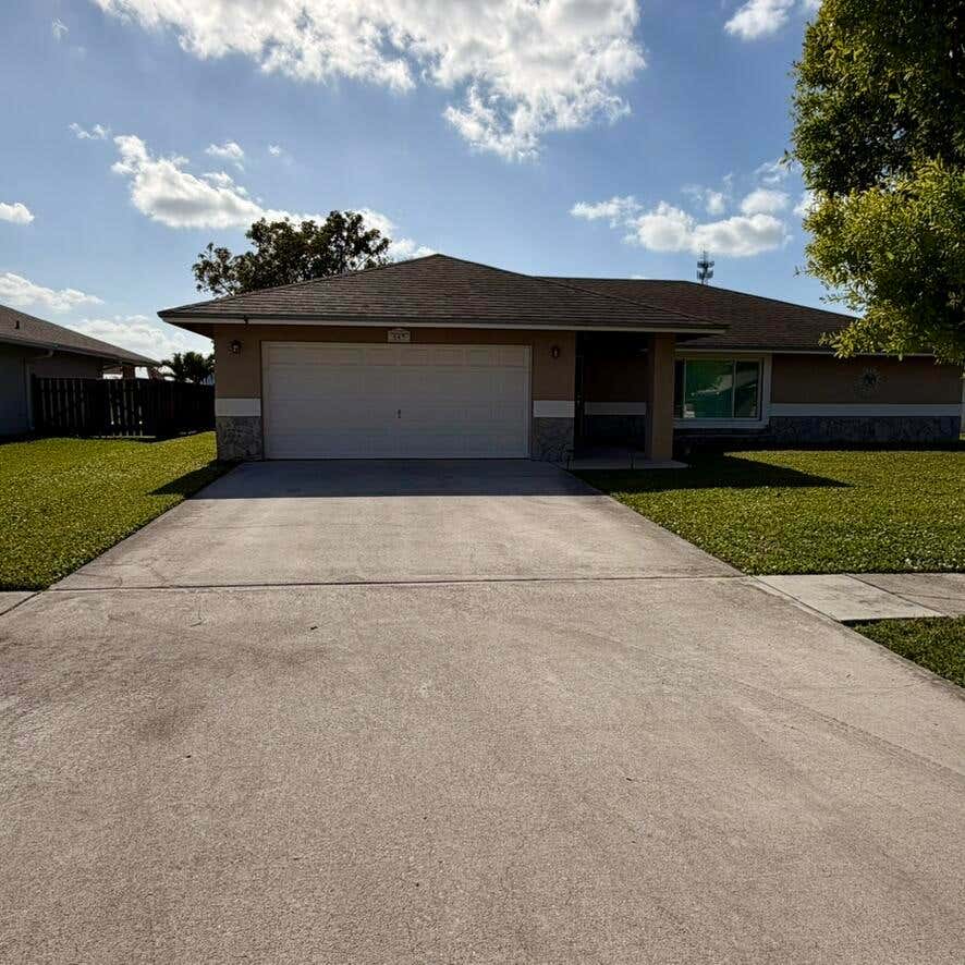 Photo of 147 Sunflower Circle, Royal Palm Beach, FL 33411 (MLS # B26040535)
