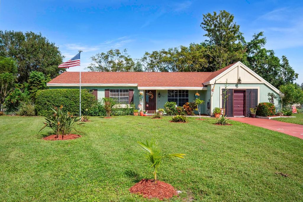 Photo of 749 SW Watson Place, Port Saint Lucie, FL 34953 (MLS # R11157613)