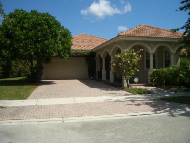 Photo of 186 VIA CATALUNHA, Jupiter, FL 33458 (MLS # B26069094)