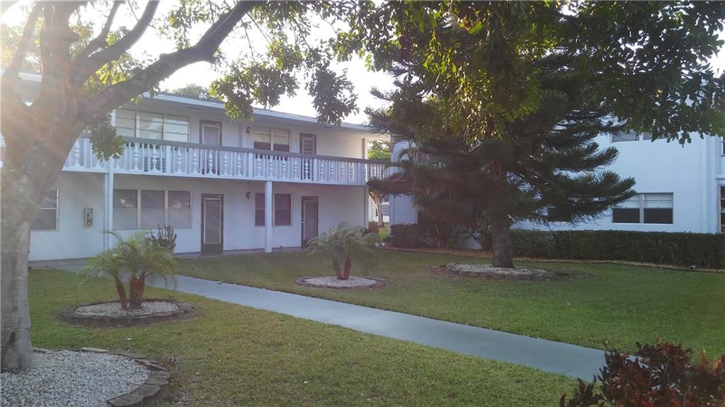Central location in Village, 1rst Floor Entrance makes for Easy Living. Located in the "Quiet Community of Oakridge Q"--- Plenty of Trees, makes for quiet living. Lots of natural light AND; Serene garden views. Tiled floors throughout. Updated kitchen AND baths. Patio Room, with **LARGE Bay Slider Windows** Extra storage. Enjoy live Broadway like shows at the Clubhouse in the 1600 seat theater. Fully equipped gym, exercise classes, billiard room AND many more activities offered all year long. Secure gated community with 24 hour security AND; courtesy shuttle. Just 3.5 miles to Deerfield Beach, shops, transportation, restaurants, AND Boca mall.
