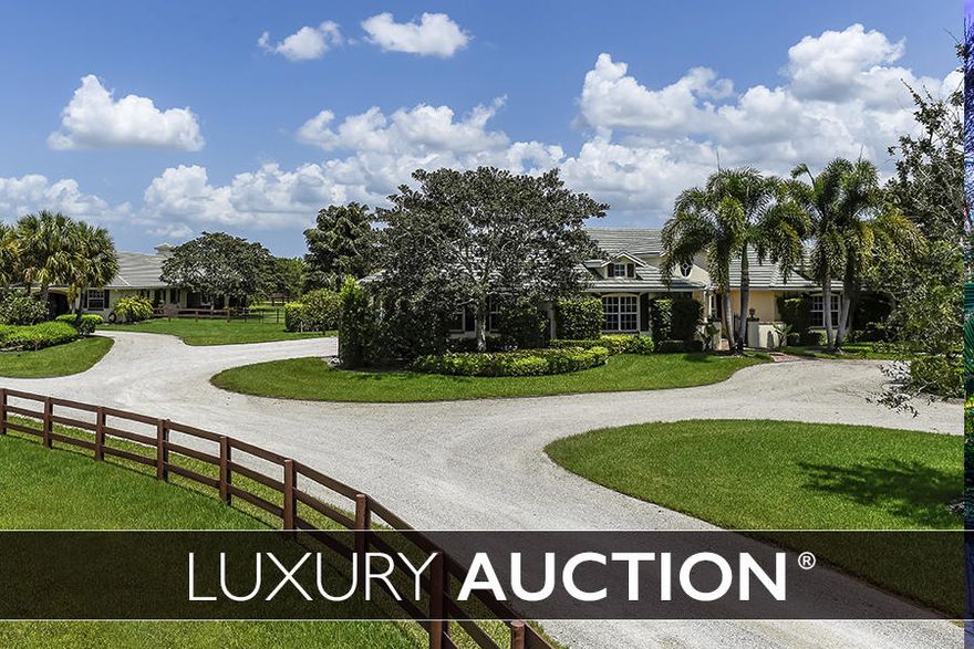 This equestrian home in exclusive PALM BEACH POINT will be sold at Luxury AUCTION ON April 21,2017. Previously offered for 5 MILLION, now selling at or above a RESERVE of only 2 million!  List price used here is FOR REFERENCE ONLY. Inquire for complete auction details. Intelligent Equestrian Estate, Lovely flow and energy to the Barn and 4 bedroom 4 bath Home. Everything you need and more. A Must See Farm and Home located by back gate of Palm Beach Point for easy hack to WEF.  New full house and barn water system and pool resurfaced,new arena footing 2016,barn A/c, 2017 new pool heater.