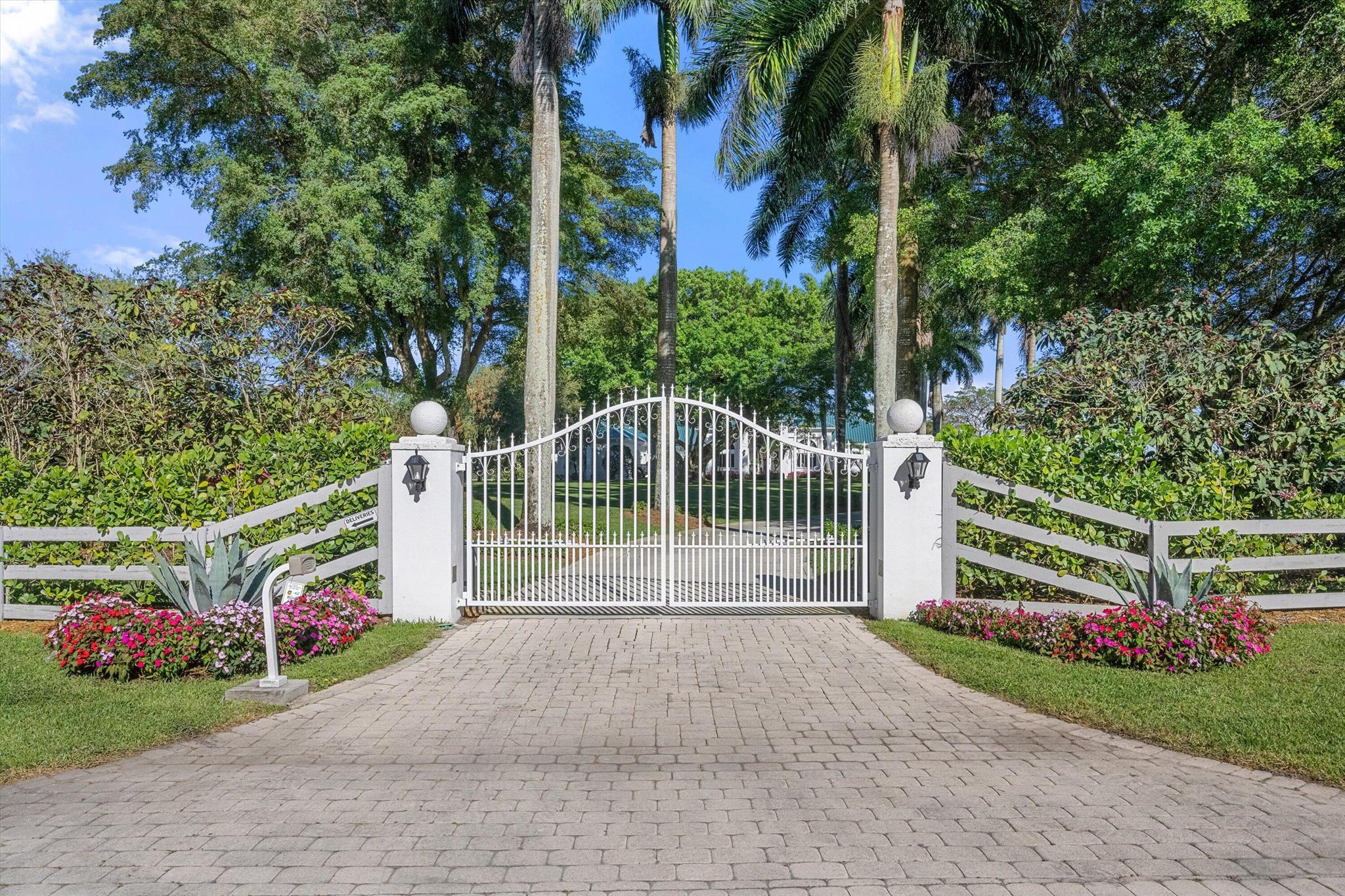 An opportunity to own a stunning lakefront equestrian estate on 3.5 acres in the rarely available Southfields neighborhood. This offering includes the adjacent lot at 3250 Santa Barbara Dr, expanding your private retreat. Enjoy breathtaking lake and canal views, an oversized pool and spa, and a flowing floor plan perfect for entertaining--with grand living spaces, formal dining, a bar, library, and soaring vaulted ceilings with fireplaces. Horses are welcome, making this the ultimate blend of luxury and equestrian living.