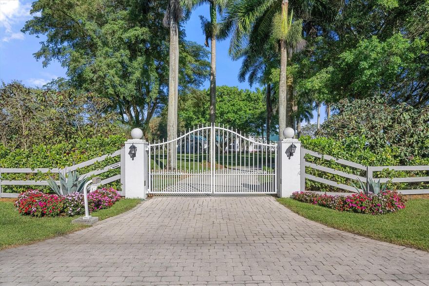 An opportunity to own a stunning lakefront equestrian estate on 3.5 acres in the rarely available Southfields neighborhood. This offering includes the adjacent lot at 3250 Santa Barbara Dr, expanding your private retreat. Enjoy breathtaking lake and canal views, an oversized pool and spa, and a flowing floor plan perfect for entertaining--with grand living spaces, formal dining, a bar, library, and soaring vaulted ceilings with fireplaces. Horses are welcome, making this the ultimate blend of luxury and equestrian living.