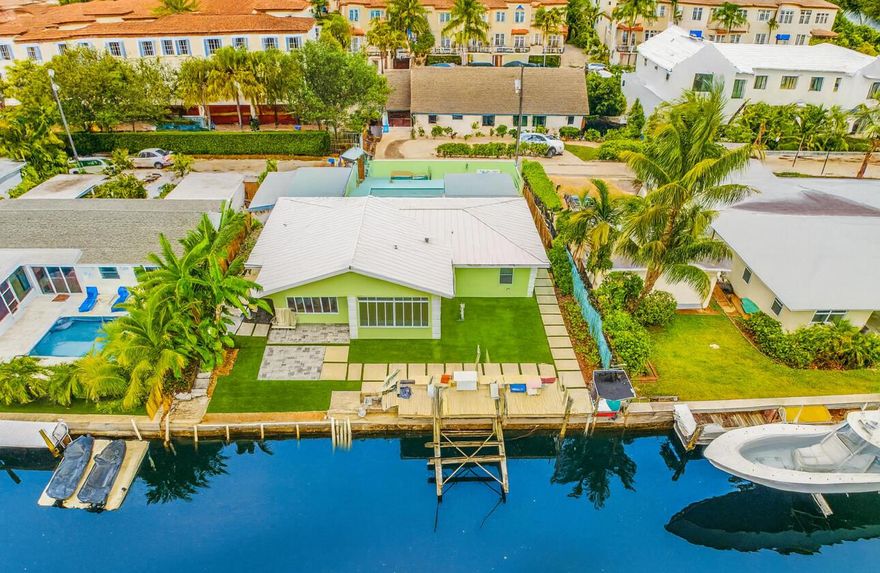 Waterfront Living in Delray Beach! Renovated 4 BR/2.5BA courtyard pool home just 3 lots from the Intracoastal and 15 min by boat to the ocean. Expanded in 2020, it features hurricane-impact glass, metal roof, wood floors & a cook's kitchen w/gas cooktop. Split-bedroom, open-concept layout flows to a private pool courtyard & backyard dock. Southern exposure, exceptional privacy & unbeatable location bike to Atlantic Ave & the beach. Offered furnished or unfurnished, 6-month or annual lease.