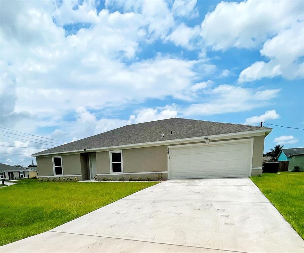 Photo of 2001 SW Burman Lane, Port Saint Lucie, FL 34984 (MLS # R10810820)