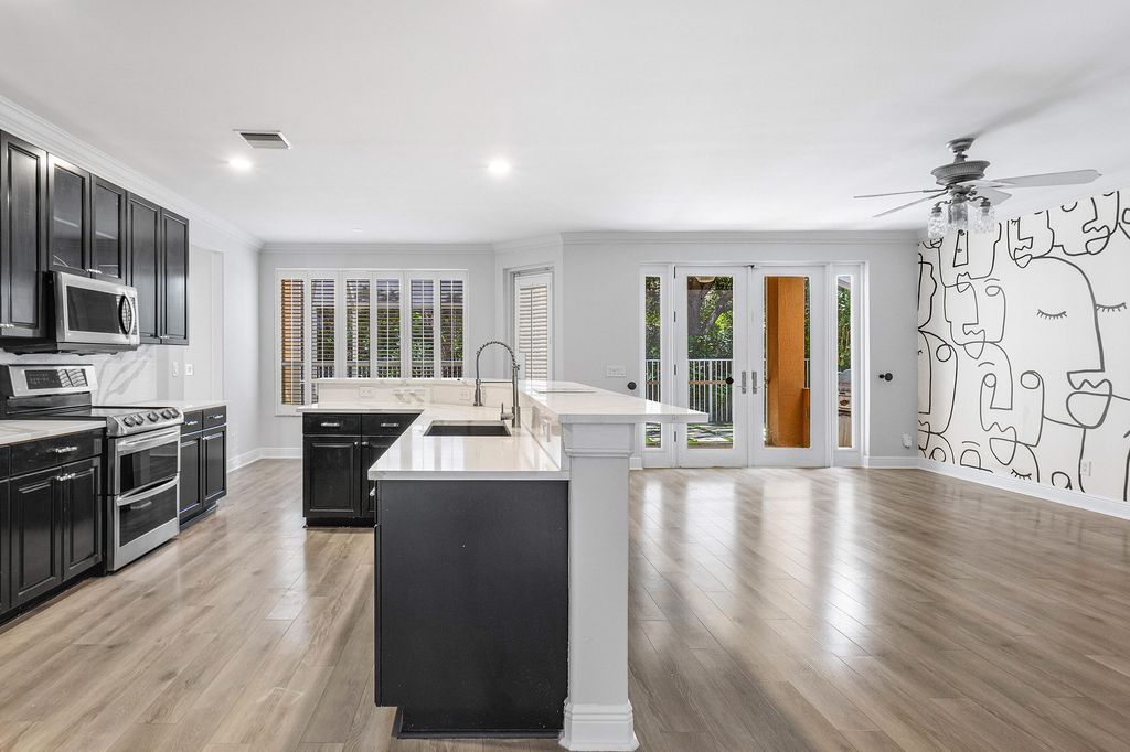 Photo of 1655 E Classical Boulevard, Delray Beach, FL 33445 (MLS # R11020092)