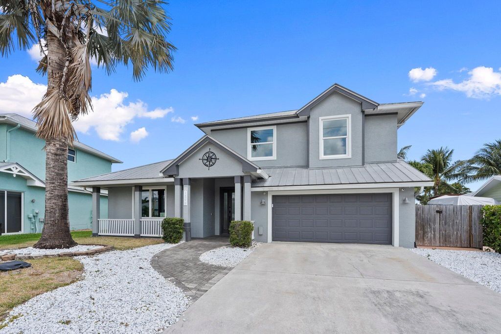 Photo of 1599 SW Dyer Point Road, Palm City, FL 34990 (MLS # R11093970)