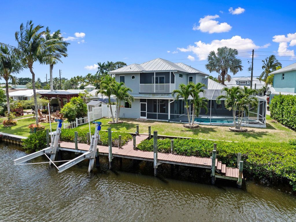 Photo of 1599 SW Dyer Point Road, Palm City, FL 34990 (MLS # R11093970)