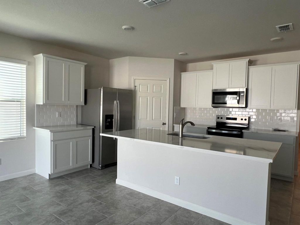 Photo of 9618 Sea Spray Drive, Fort Pierce, FL 34945 (MLS # R11143207)