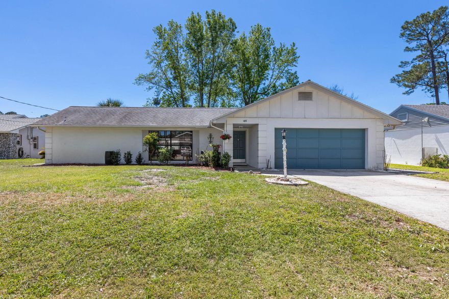 Bright and full of potential, this home features open living spaces that flow naturally from the kitchen to the dining and living areas, creating a welcoming atmosphere for everyday life and entertaining! The screened-in patio and fully fenced backyard—featuring a vinyl fence installed in 2024—offer a private outdoor space perfect for relaxing, hosting friends, or enjoying Florida weather. Additional outdoor improvements include two backyard drains added in 2025 for enhanced functionality and peace of mind. Inside, all outlets and plugs were updated in 2025, complementing the home's existing systems, including a 2019 electrical panel and breakers, a 2016 HVAC system, a 2014 hot water heater, and a 2013 roof.  Together, these updates give buyers a clear picture of the home's condition while still leaving room to make it their own. Just 15 minutes from the beach and about 30 minutes to both St. Augustine and Daytona Beach, the location combines easy coastal access with convenient shopping, dining, and schools nearby. Ideal for investors or buyers looking for a home with solid structure and potential, this property gives you the flexibility to shape it to your vision. Schedule your showing today to see the possibilities, and make this house your home!