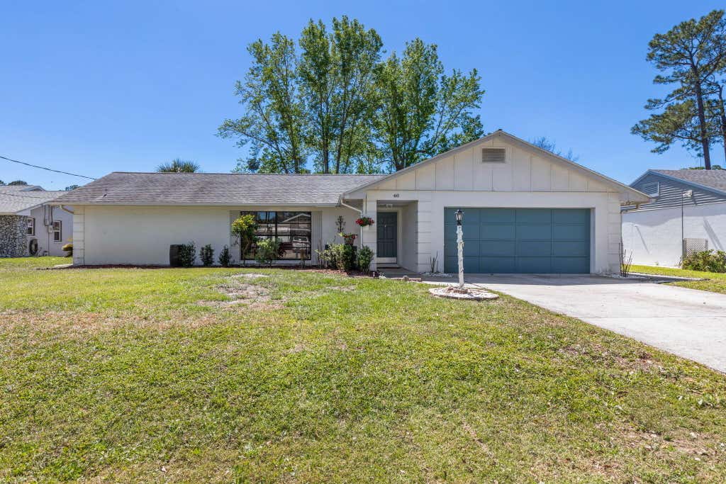 Photo of 46 Berkshire Lane, Palm Coast, FL 32137 (MLS # B26027935)