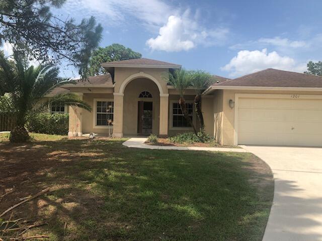 Photo of 1201 SW Idol Avenue, Port Saint Lucie, FL 34953 (MLS # B26037611)