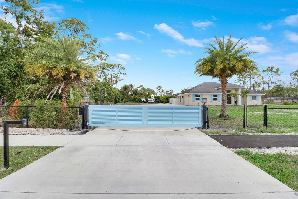 Photo of 14271 Citrus Grove Boulevard, The Acreage, FL 33470 (MLS # R11146593)