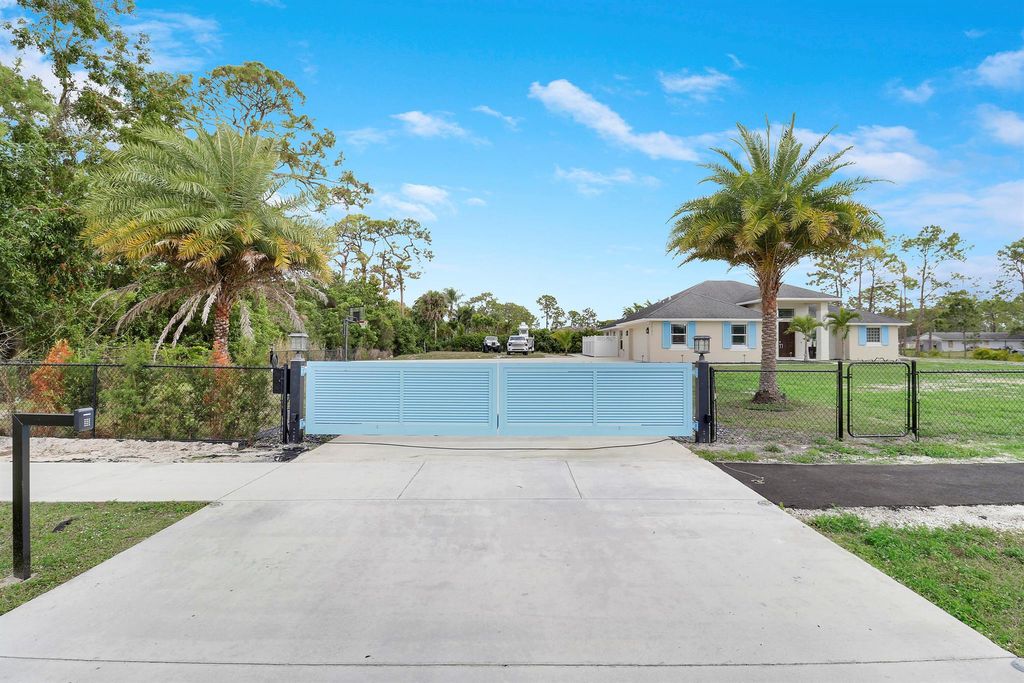 Photo of 14271 Citrus Grove Boulevard, The Acreage, FL 33470 (MLS # R11146593)