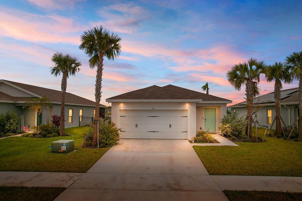 Photo of 212 Raspberry Road, Fort Pierce, FL 34981 (MLS # R11081546)