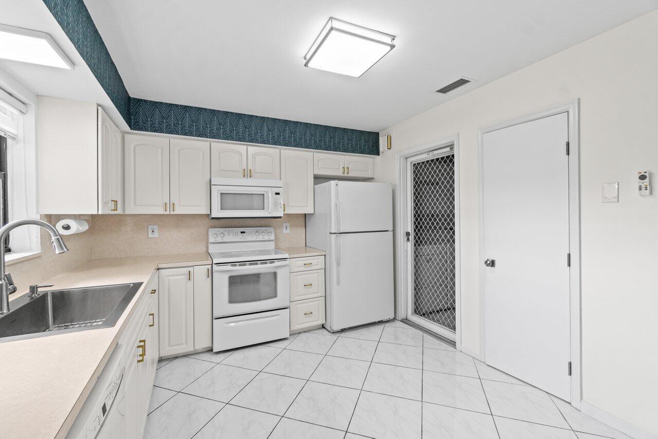 9750 Tabebuia Tree Drive A