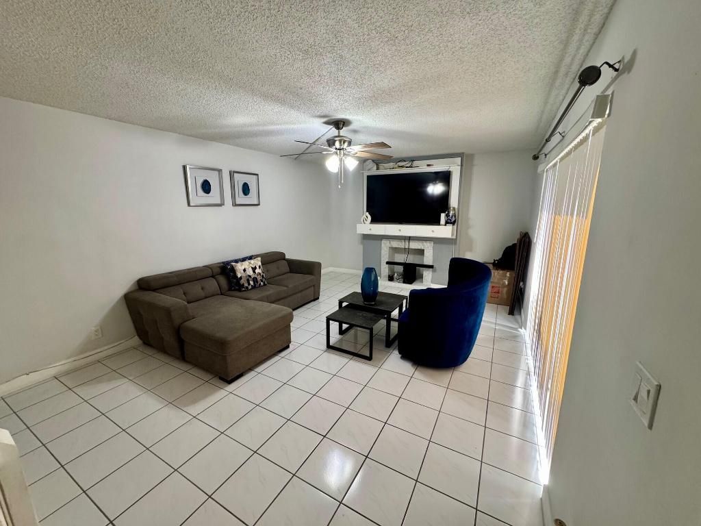 Photo of 1684 Forest Lakes Circle #A, West Palm Beach, FL 33406 (MLS # R11098233)