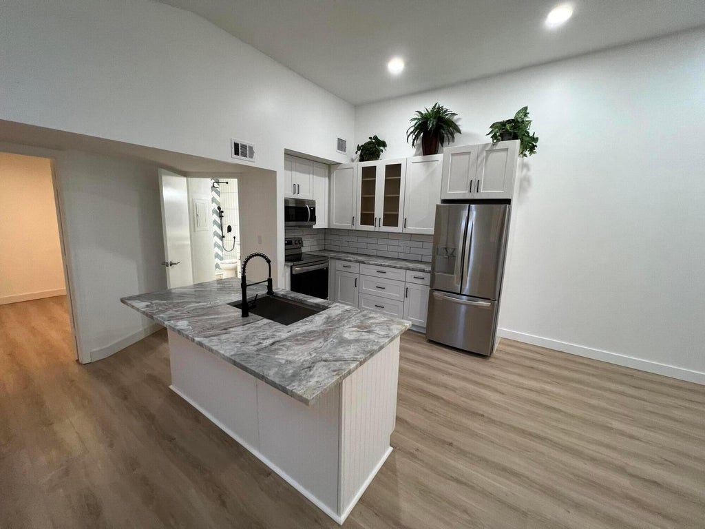Photo of 1335 Crystal Way #D, Delray Beach, FL 33444 (MLS # R11105066)