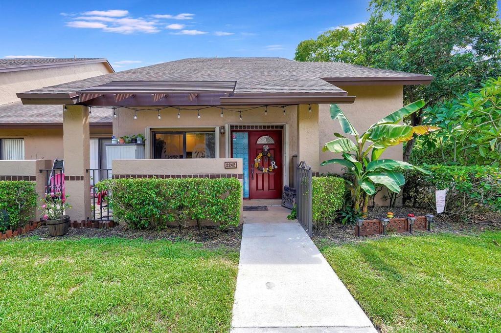 Photo of 2242 NW 39th Ave, Coconut Creek, FL 33066 (MLS # F10405291)