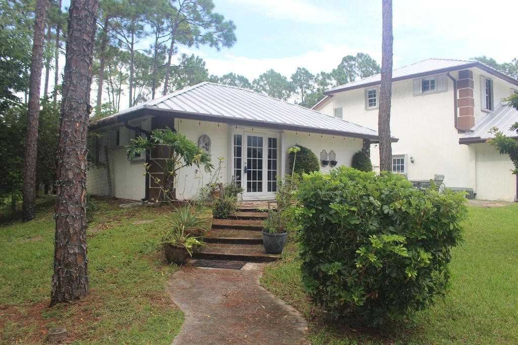 Photo of 12667 88th Place N #Guest House, West Palm Beach, FL 33412 (MLS # B26028167)