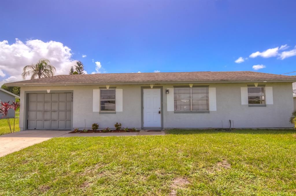 Photo of 3590 SW Rosardo Street St, Port St Lucie, FL 34953 (MLS # R10820571)