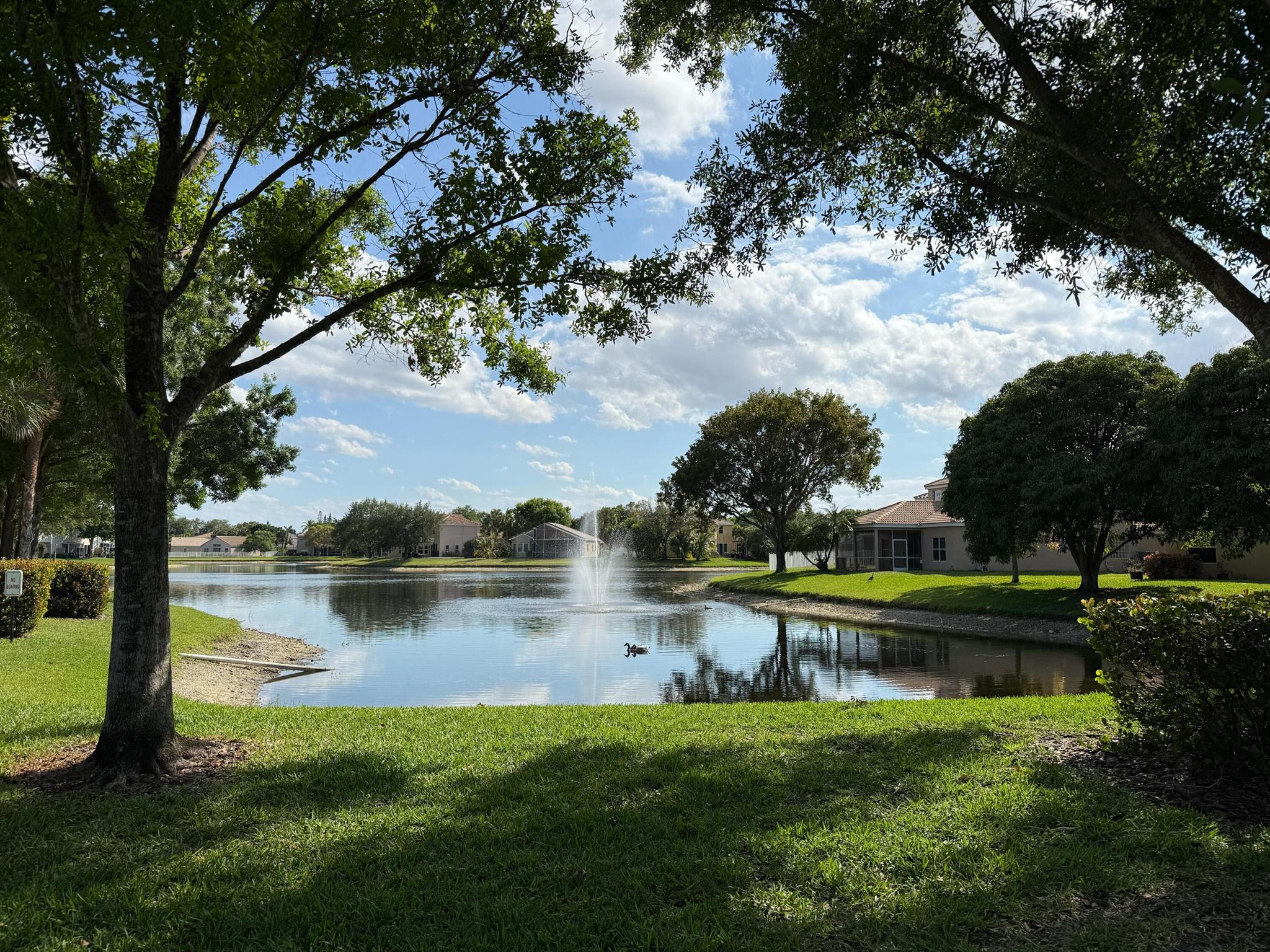 Welcome to your DREAM home in the coveted gated community of Victoria Isles! Enjoy peaceful lake views from the front of your home! This beautifully maintained 3 bedroom, 2 bathroom residence sits on a desirable corner lot and offers a perfect blend of comfort, privacy and style. Step into a bright, airy, spacious interior filled with natural light, creating a welcoming ambiance, ideal for both relaxing and entertaining. A beautiful updated kitchen with granite countertops and stainless steel appliances. A newer AC 2022, Hot water heater 2024, and a central vacuum system. The lush and vibrant garden offers a tranquil outdoor oasis, ample space to unwind on your screened in patio-or even add your dream pool to enjoy with family and friends. Located in a quiet, well-maintained community