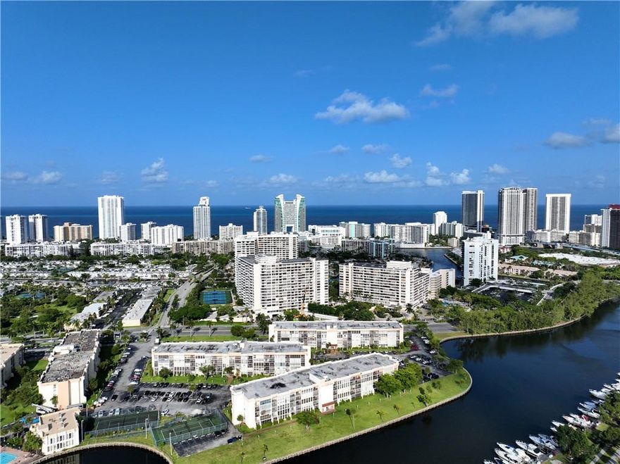 Welcome to DeSoto Park Condominiums! Located in the heart of Hallandale Beach, this 2BD 2BA condo is commodious encompassing over 1,200 SqFt. This convenient 1st floor corner unit offers an open layout & split bedroom floor plan. Each bedroom is spacious, equipped with a walk-in closet. Beautiful floor-to-ceiling windows illuminate the entire space. Boasting stunning, waterproof laminate floors + updated kitchen & bathrooms. Adjacent to the living room is a practical space presently used as an office that comes furnished with a retractable wall. This flexible space can be used as an office, additional living room area or even a 3rd/guest bedroom. DeSoto Park Condominium is situated just West of Hollywood Beach and only minutes from Gulfstream Park & Casino. Equal Housing Opportunity.