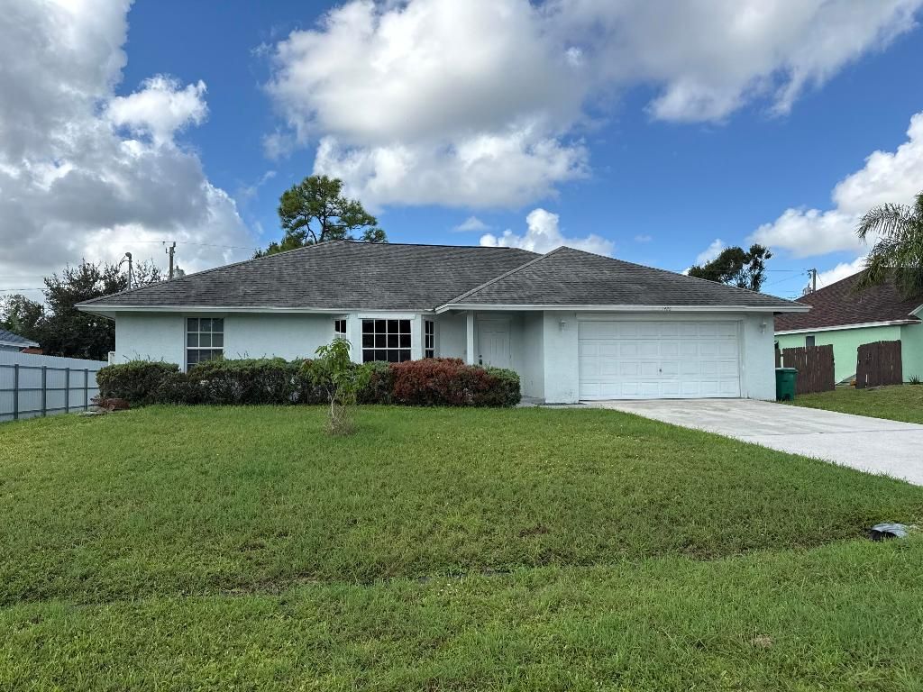 Photo of 1426 SW Prairie Circle, Port Saint Lucie, FL 34953 (MLS # R11130477)