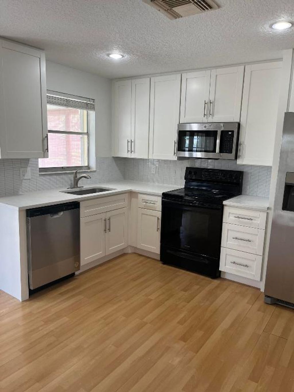 Photo of 119 Deerfield Drive, Jupiter, FL 33458 (MLS # R10988931)