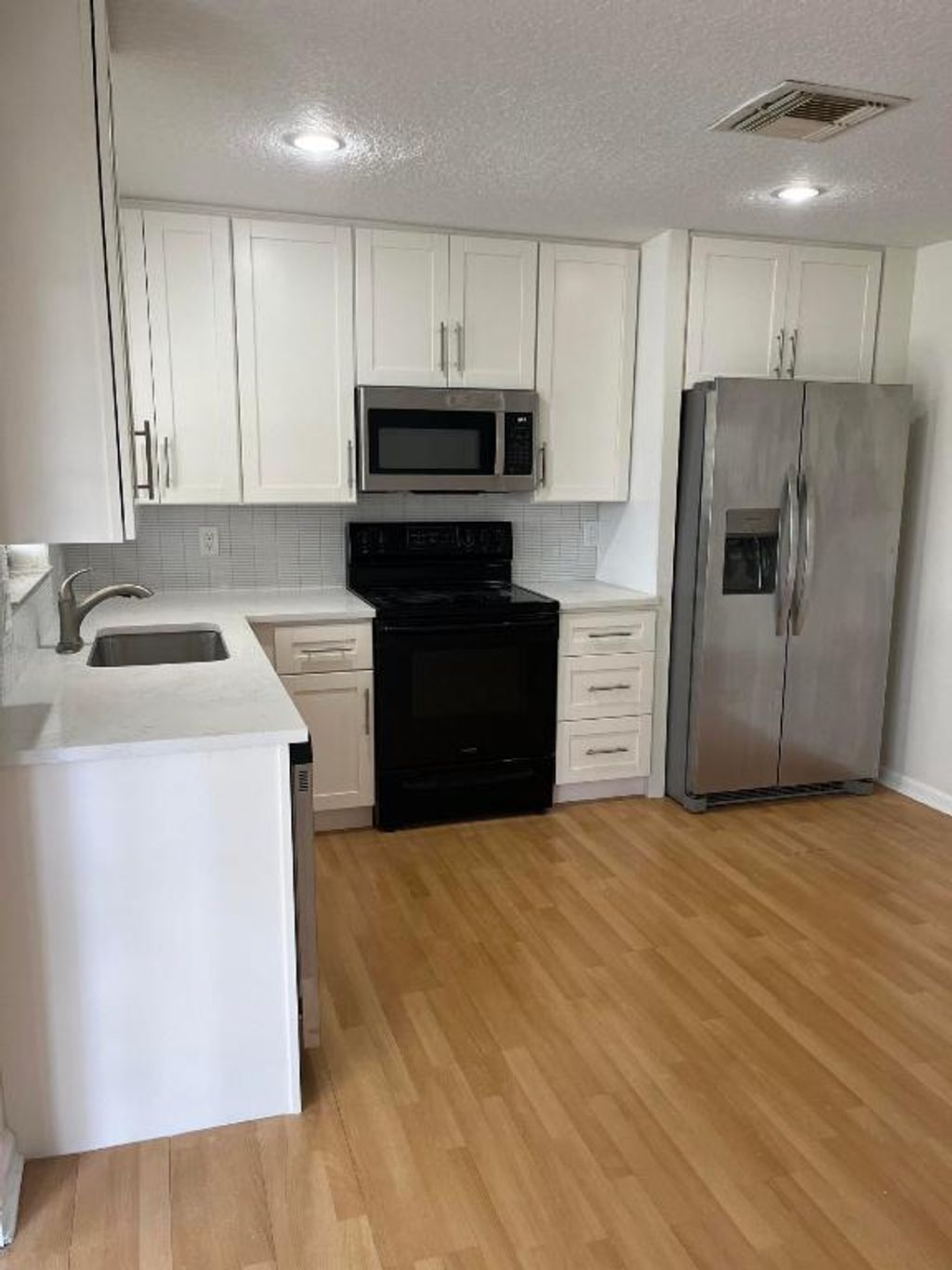 Photo of 119 Deerfield Drive, Jupiter, FL 33458 (MLS # R10988931)