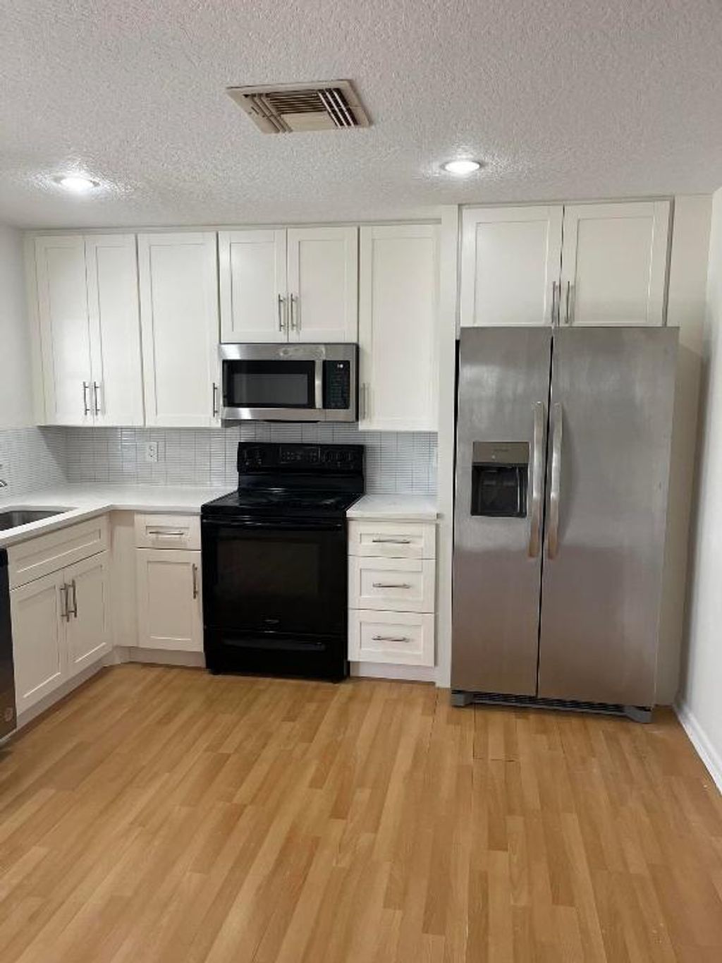 Photo of 119 Deerfield Drive, Jupiter, FL 33458 (MLS # R10988931)