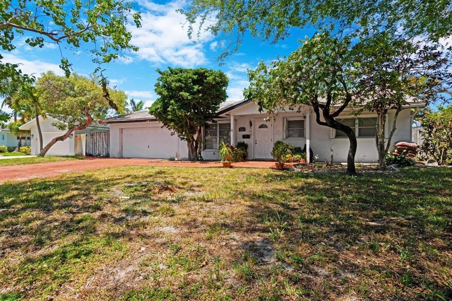 Originally the builder's lot was the largest noncorner lot of the area. This charming pool home is Classic Florida living. There is a large covered outdoor space overlooking a full-sized crystal blue pool. 3 bedrooms and two baths. Tile floor throughout. If you are looking for a blank slate to put your touches on this is your house. Conveniently located to restaurants, airports, highways, shopping, and most importantly beautiful beaches and A rated elementary school.